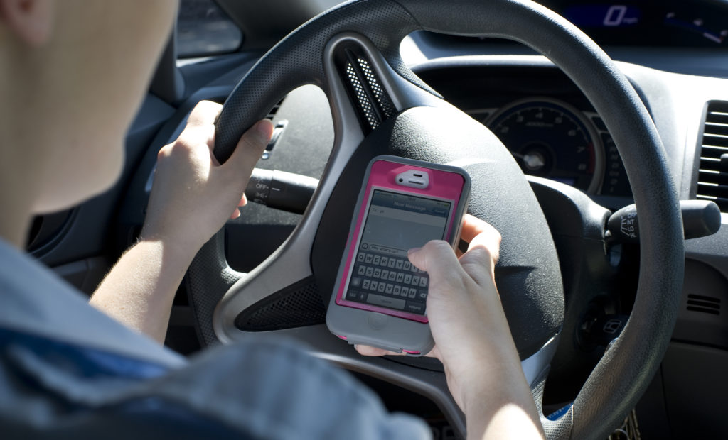 Texting and Driving: An Unlawful Combination